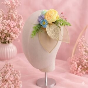 Garden-Inspired Headpiece Featuring Pastel Blooms, Golden Details, and Gentle Greenery