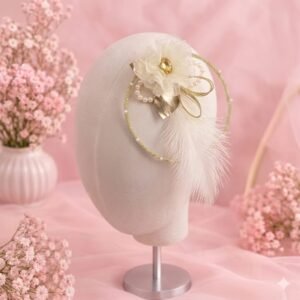 Elegant Ivory and Gold Headpiece Featuring a Ruffled Flower, Pearls, and Feather Details